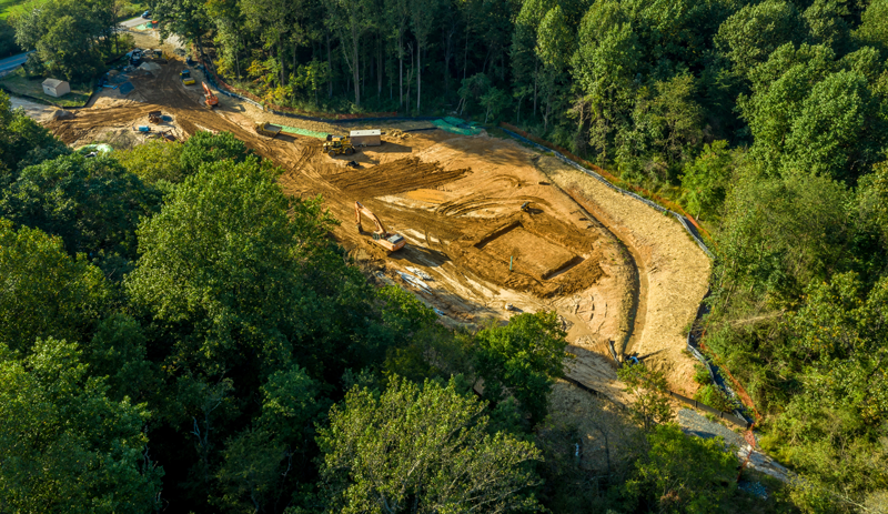 Aerial view of cleared and graded land prepared for a new home build