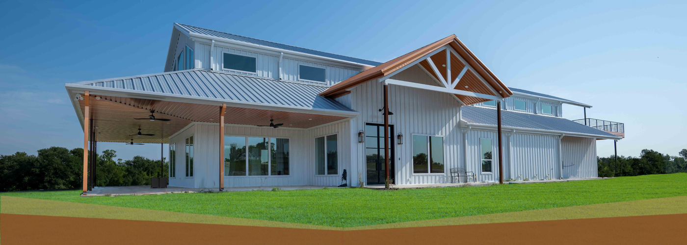 Custom barndominium with standing seam metal roof built by 1802 Build Co. in East Texas