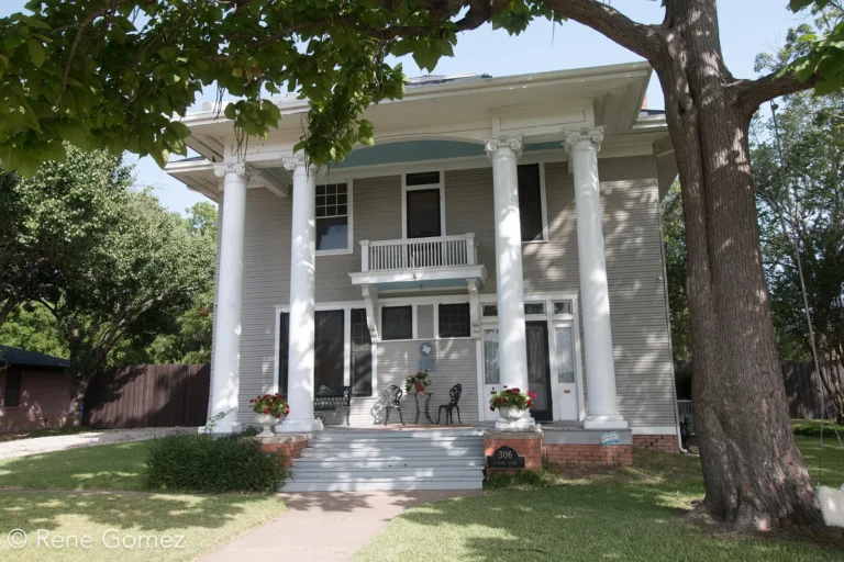 Historic two-story home with columns in Forney, Texas